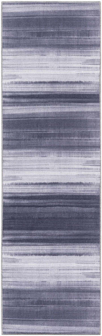 Close-up of Calvin Klein Launder rug in grey and blue. Modern striped pattern with subtle texture. Washable area rug.