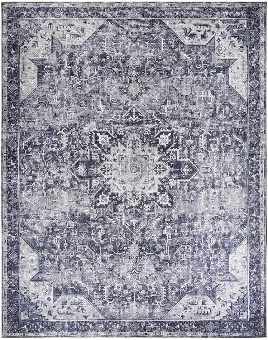 Close-up of a Nourison Charcoal Grey Vintage Washable Area Rug with taupe accents and a distressed, ornate medallion pattern.