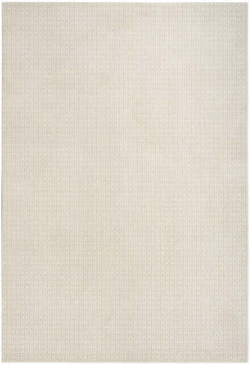 Close-up of the DKNY Atlantic Avenue Beige rug. High pile with a subtle, textured geometric pattern.