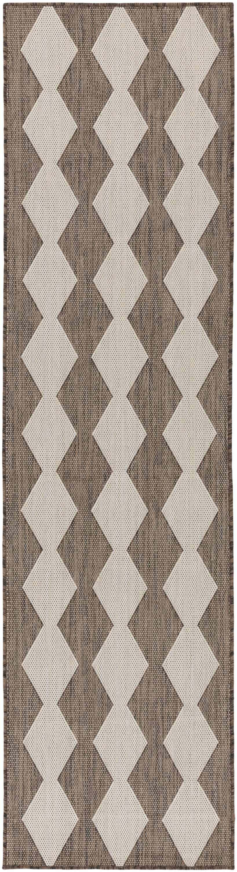 Close-up of Nourison Positano Natural Modern Area Rug with a brick red and cream geometric diamond pattern.