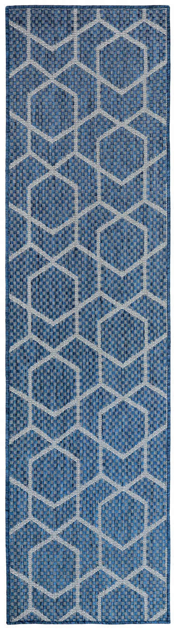 Close-up of the Nourison Horizon Denim Modern Area Rug. Features a geometric pattern in denim blue and white.