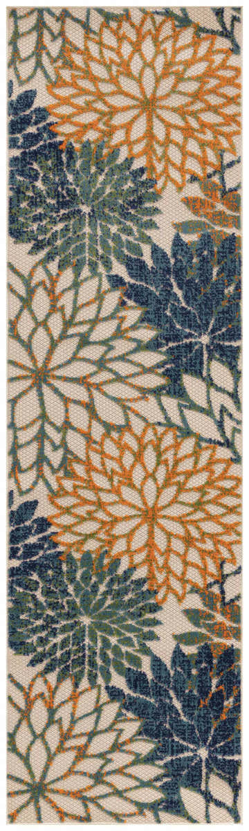 Close-up of Nourison Aloha Blue Green Tropical Area Rug featuring a floral pattern in blue, green, and orange.