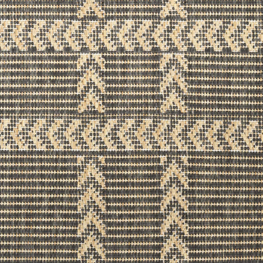 Close-up of the Nourison Horizon Charcoal rug, showing its woven texture and taupe and charcoal mid-century modern pattern.