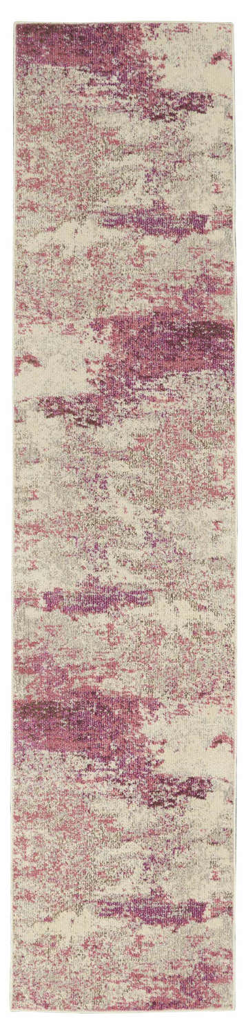 Close-up of the Nourison Celestial Ivory Pink rug. Abstract chestnut, pink, and ivory pattern. Machine-made polypropylene texture.