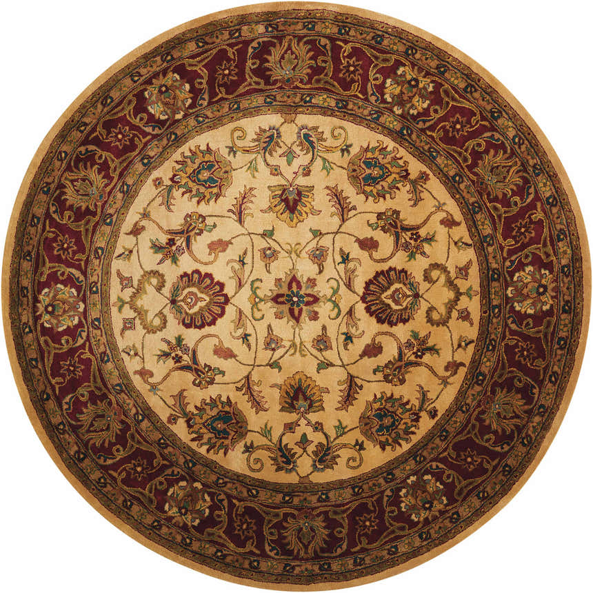 Close-up of round Nourison Jaipur Light Gold rug. Handmade wool rug with floral pattern in light gold, red, and green.