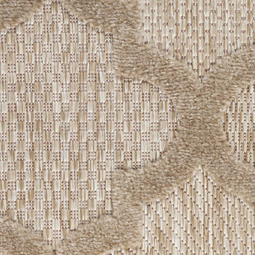 Close-up of the Nourison Easy Care Natural Beige rug showing geometric pattern and woven texture.