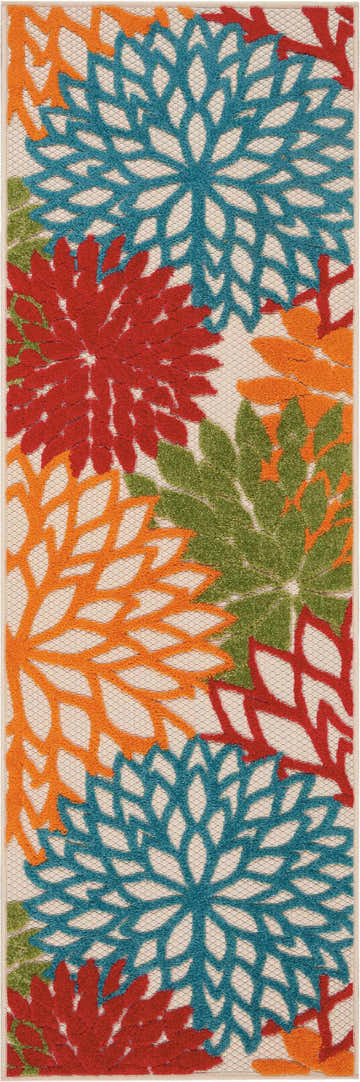 Close-up of the Nourison Aloha Green Tropical Area Rug featuring a floral pattern in green, red, orange, and blue.