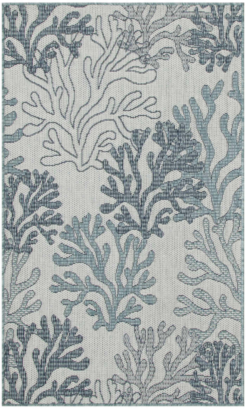 Close up of Nourison Garden Oasis Blue rug featuring a coral design. Coastal style.