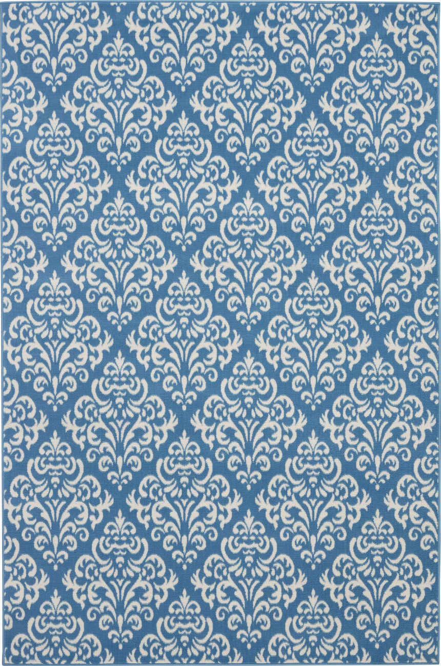 Close-up of the Nourison Grafix Blue Vintage Area Rug, featuring a damask pattern in light blue and white.