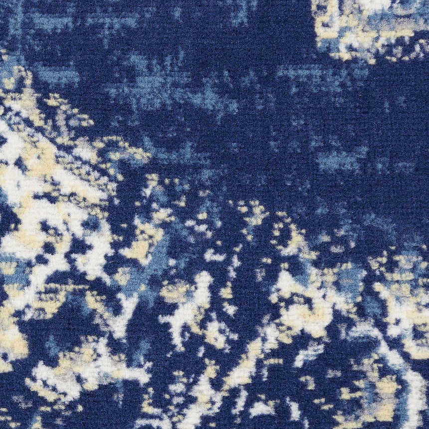 Close-up of the Nourison Grafix Navy Blue Vintage Area Rug showing its abstract pattern and texture.