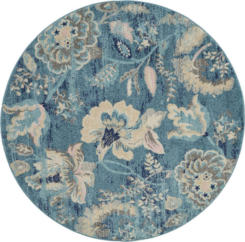 Close-up of a round Nourison Tranquil Turquoise Vintage Area Rug with a floral pattern in aqua, beige, gray, and pink.