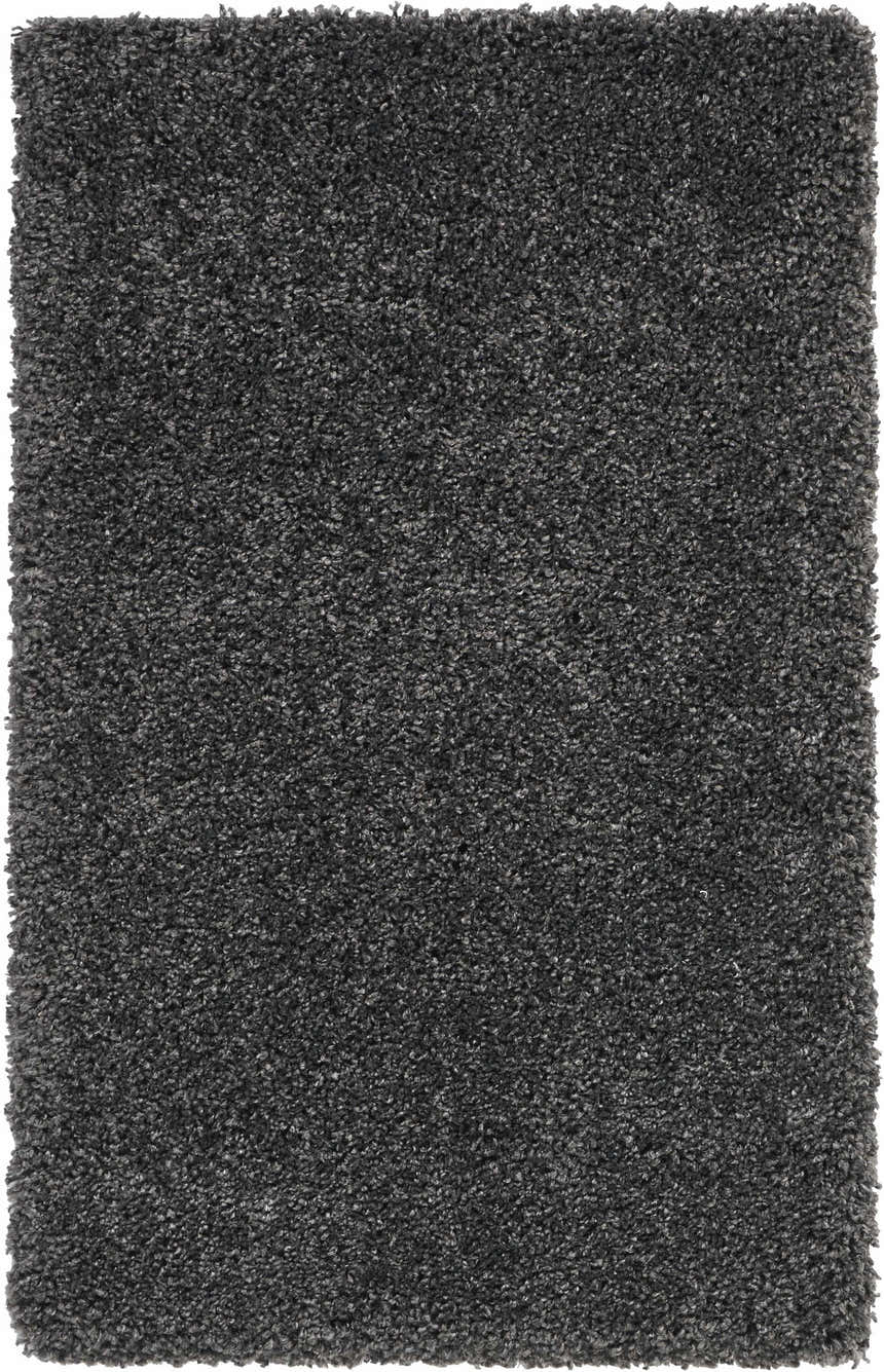 Close-up of the plush texture of the Nourison Malibu Shag Dark Grey rug. Soft, dense pile in medium gray tones.