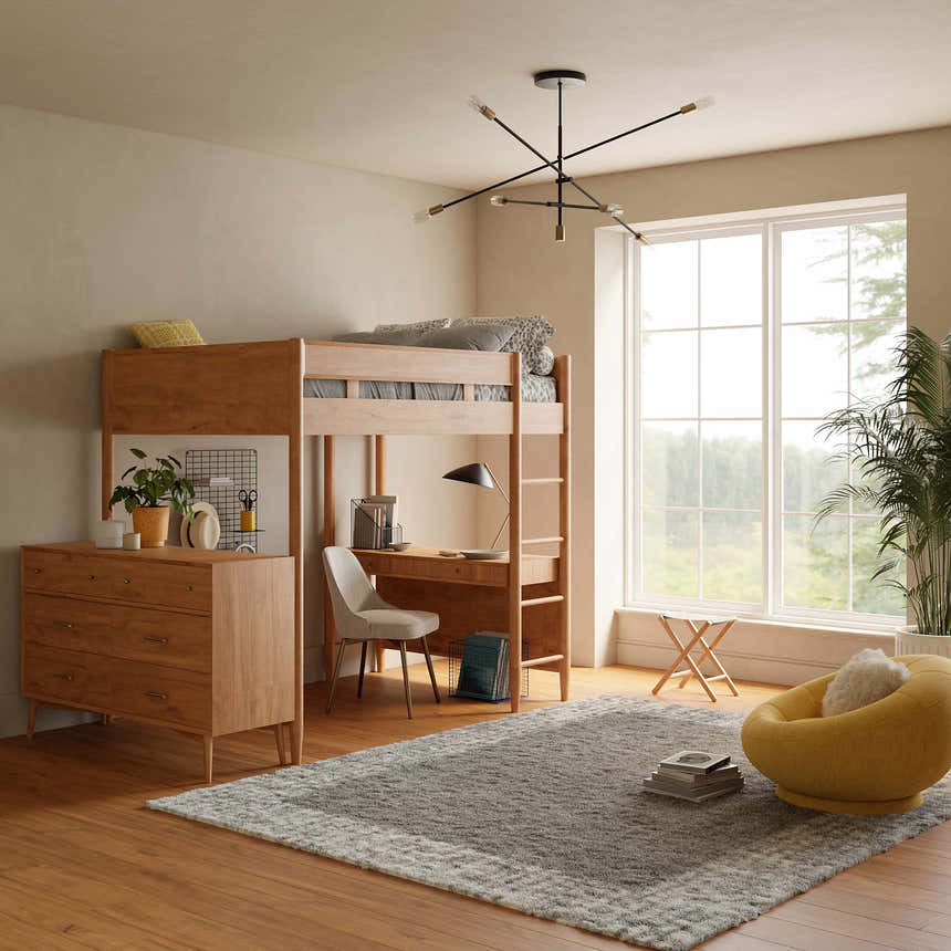Bedroom scene with Nourison Pacific Shag grey rug, loft bed, yellow chair, and wood floors.