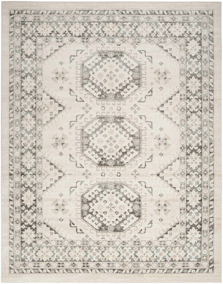 Close-up of Nourison Serenity Home Ivory Grey rug with vintage geometric pattern and high pile texture.