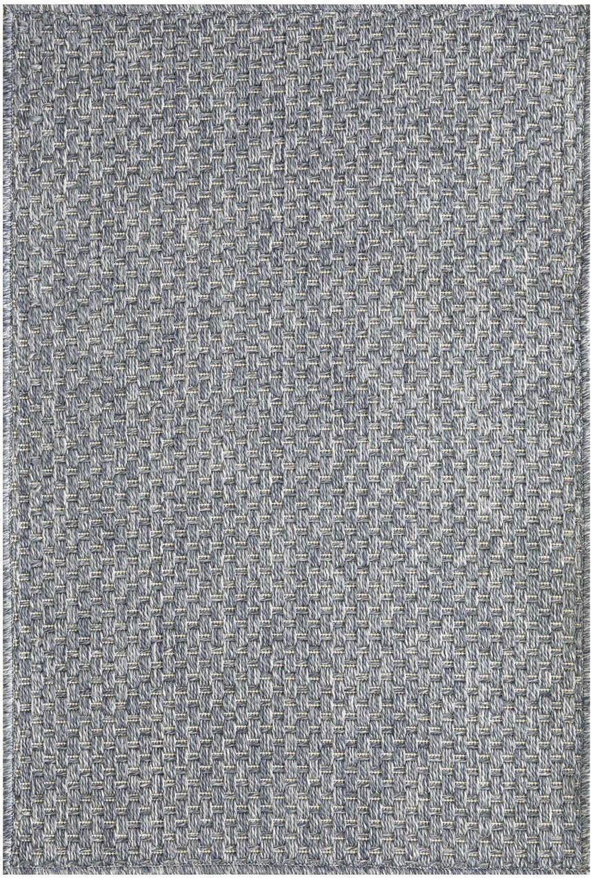 Close-up of the Nourison Tulum Denim Outdoor Area Rug showing a woven texture and denim blue color.