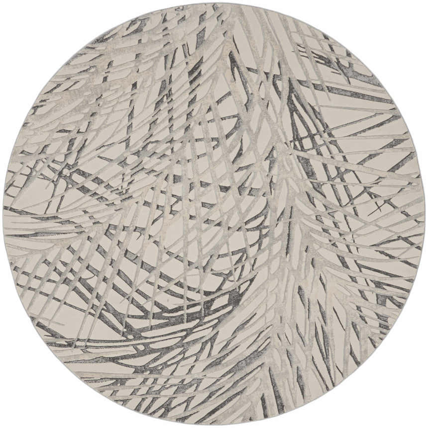 Close-up of the round Nourison Rustic Textures Ivory/Grey rug with a modern, abstract chestnut pattern.