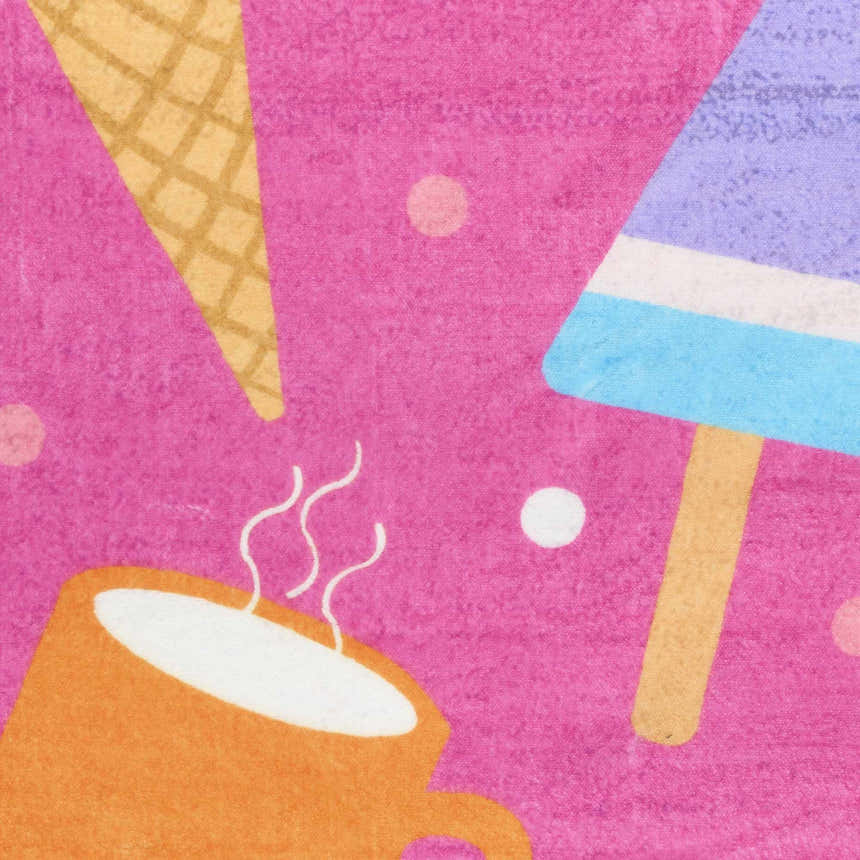 Close-up of Nourison Imagination Pink Multicolor Kids Rug featuring ice cream, popsicle, and coffee cup designs.