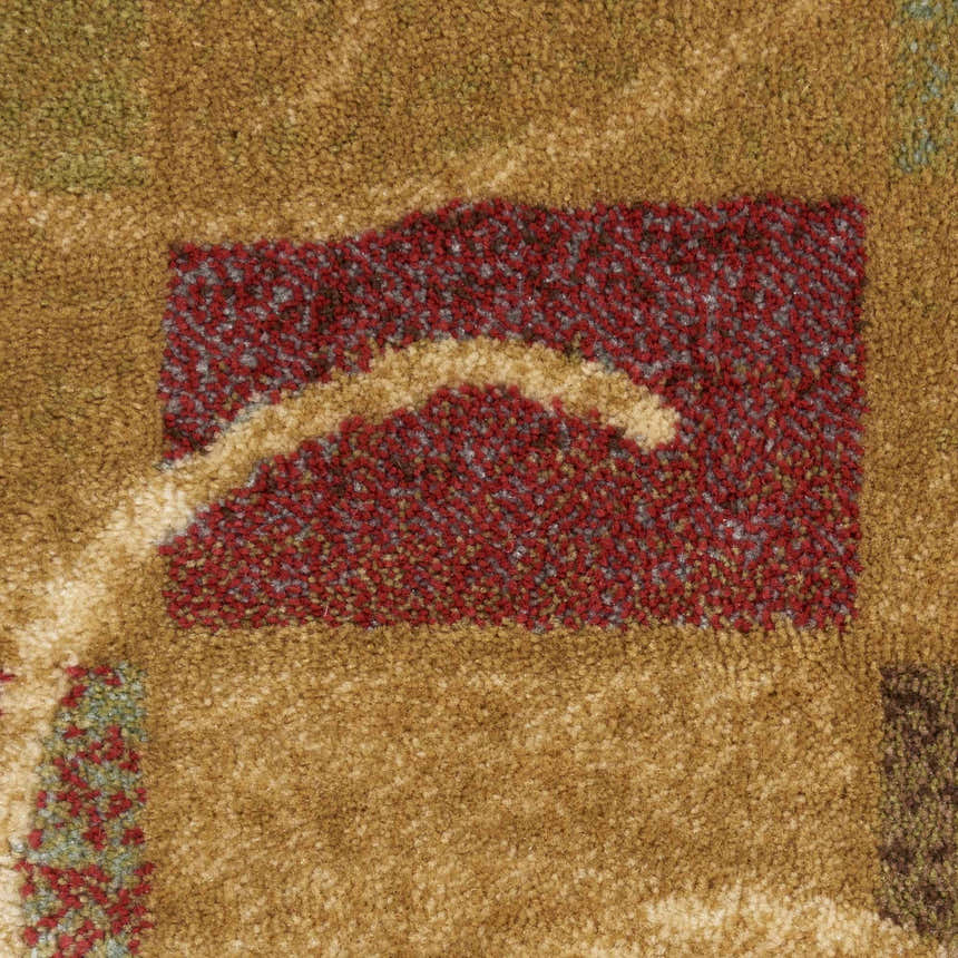 Close-up of the textured Nourison Expressions Beige rug with a red and beige geometric pattern.