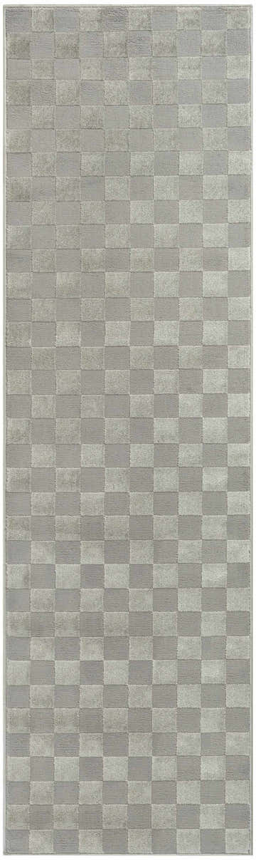 Close-up of the Nourison Serenity Home Grey rug. Modern checkerboard pattern in light and dark gray tones. High pile texture.