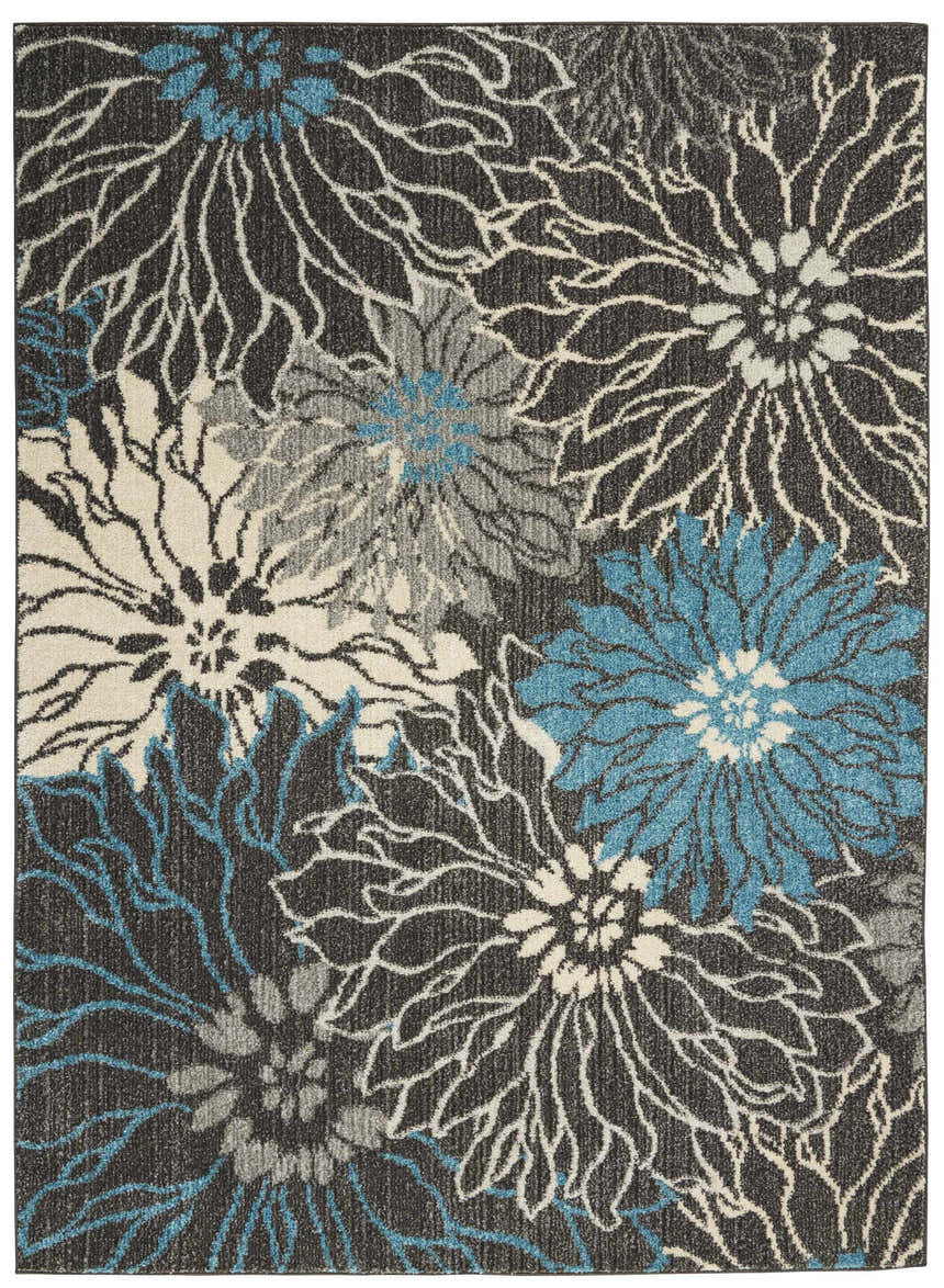 Close-up of the Nourison Passion Charcoal Blue rug, featuring a floral pattern in taupe, gray, and blue on a charcoal background.