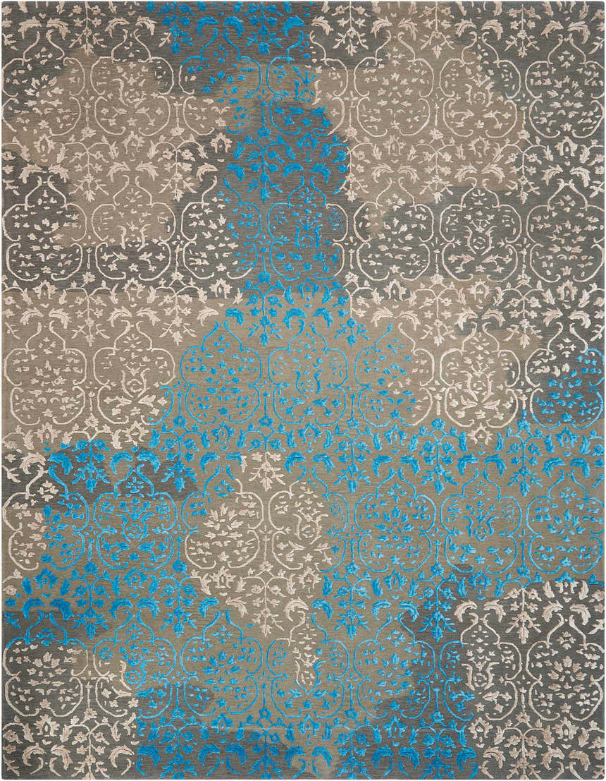 Close-up of Nourison Opaline Charcoal Vintage Area Rug. Taupe, gray, and bright blue floral and damask pattern. Handmade rug.