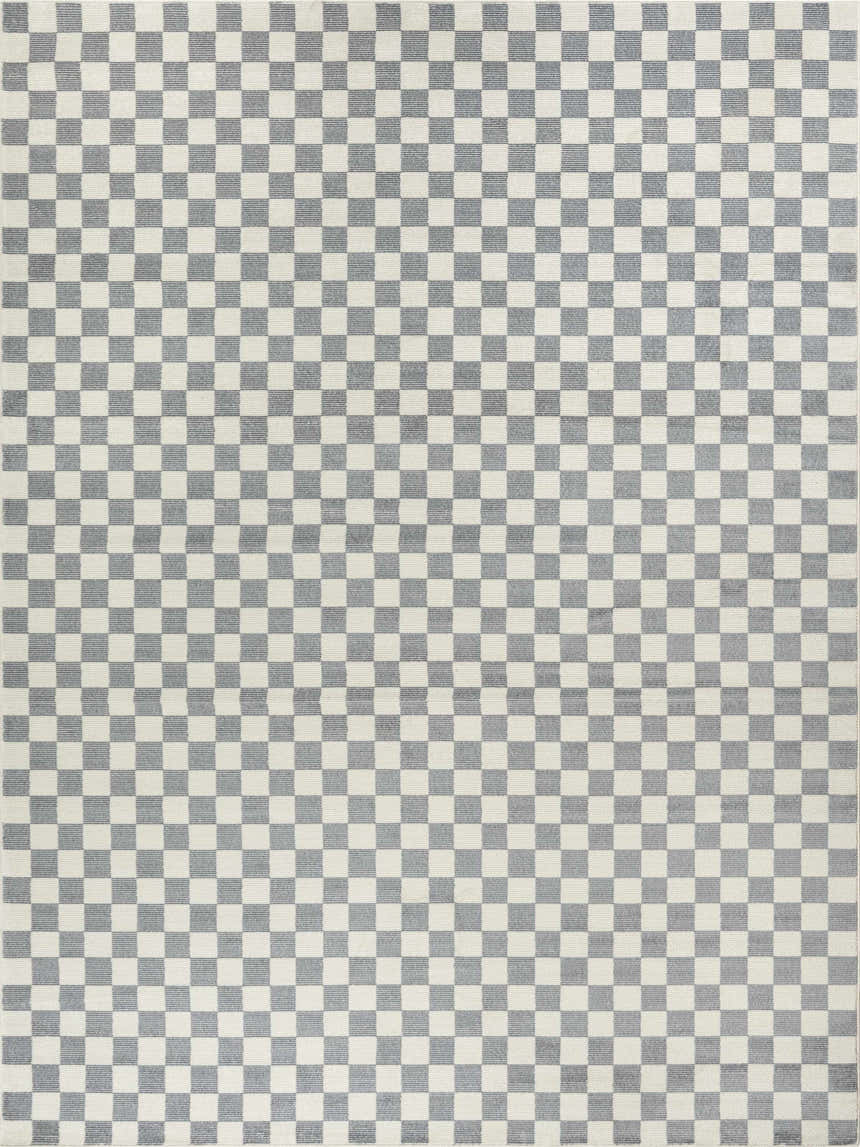 Close-up of Nourison Serenity Home Ivory Blue rug with a checkerboard pattern. Modern, high pile rug.