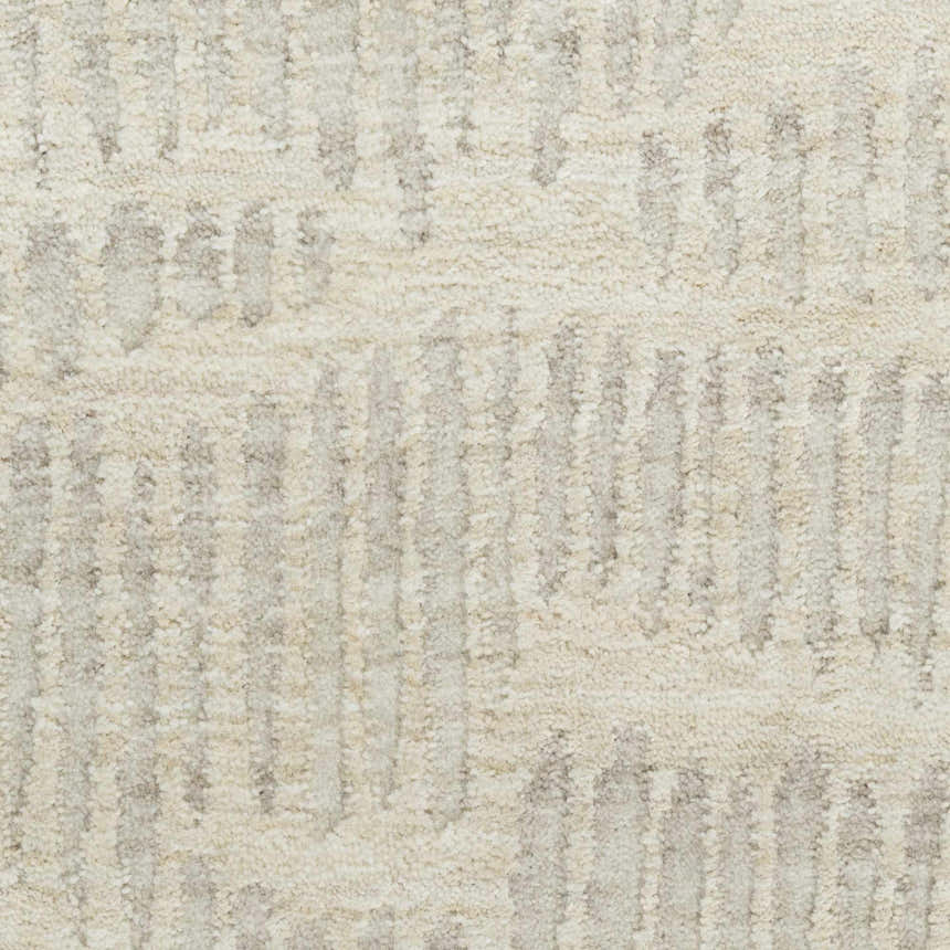 Close-up of the Calvin Klein CK079 Notes rug. Ivory and silver tones with a subtle, textured, modern pattern.