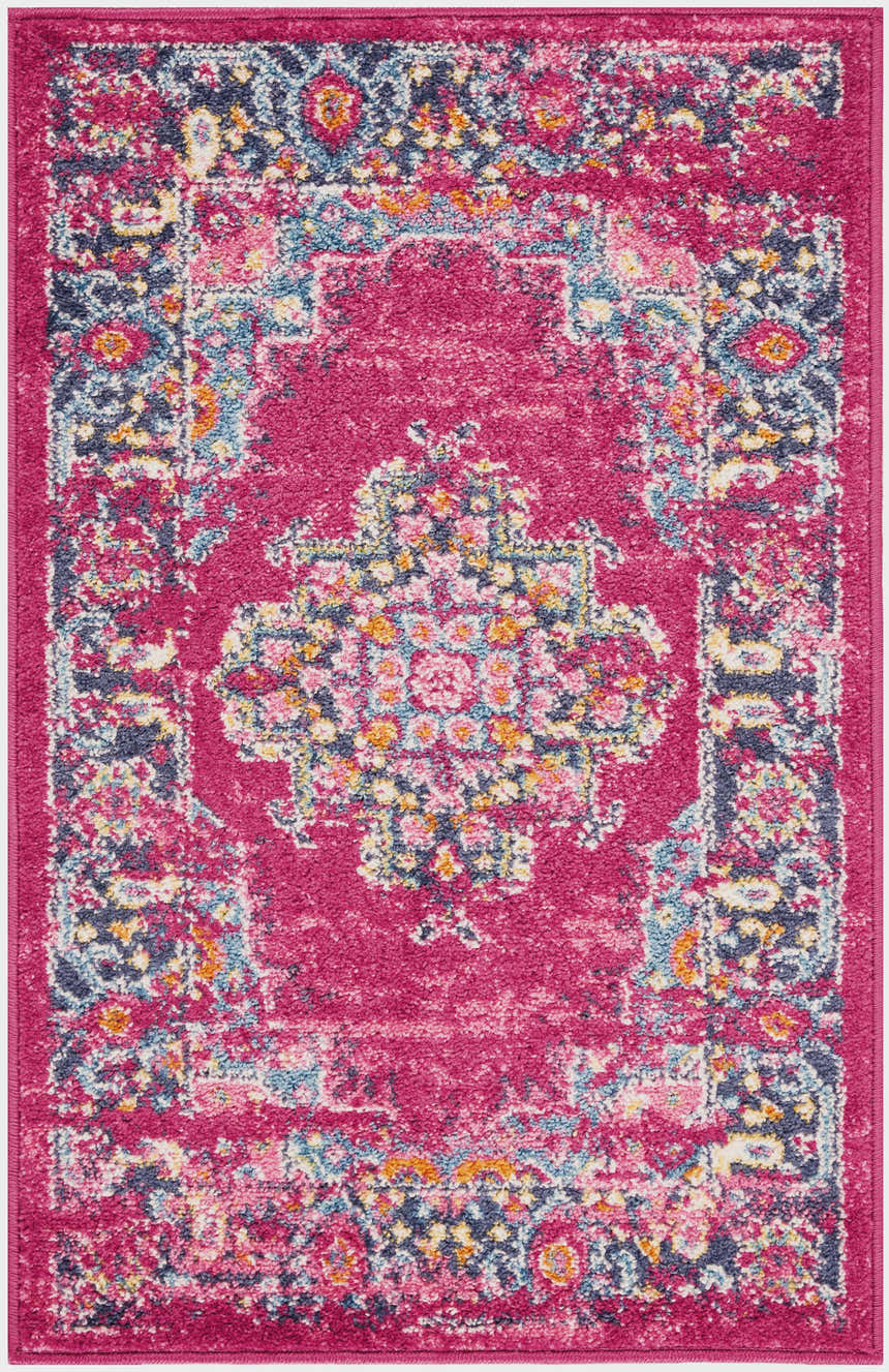Close-up of Nourison Passion Fuchsia rug. Bohemian style with floral pattern in fuchsia, blue, pink, and orange tones.