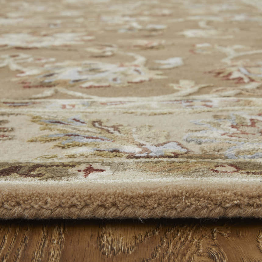 Close up of the Feizy Prescott Tan/Ivory Area Rug showing floral pattern, texture, and pile height. Pile