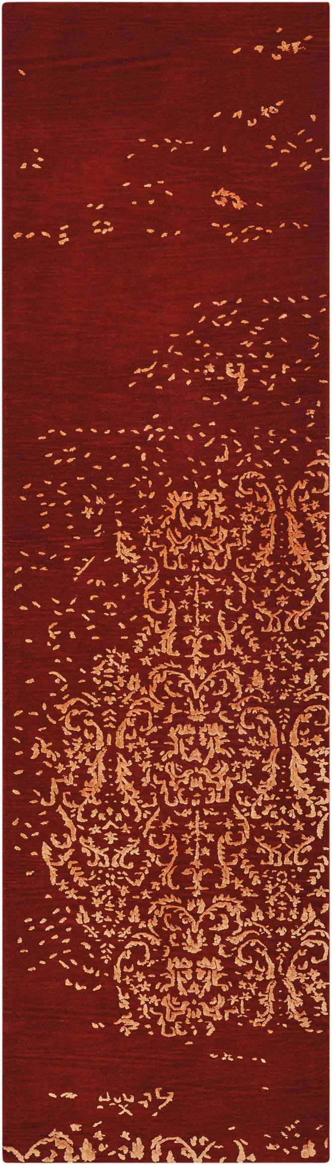 Close-up of Nourison Opaline Fire Vintage rug. Fire-colored wool rug with distressed gold floral design. Handmade runner.