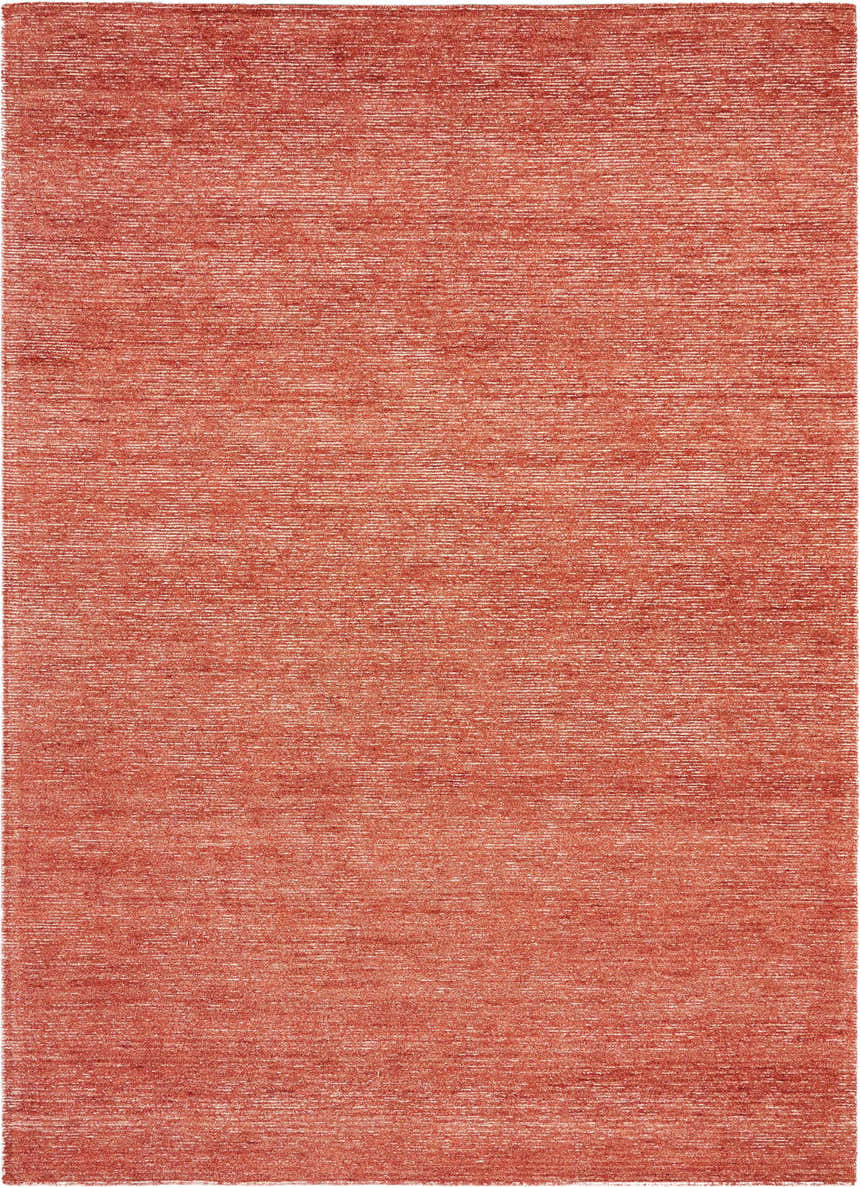 Close-up of the Nourison Weston Brick Modern Area Rug. Brick red color with subtle horizontal texture. Handmade rug.
