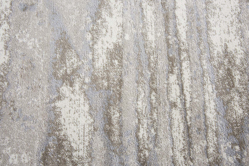 Close-up of the Rizzy EN7264 area rug, featuring a contemporary beige, ivory, and gray abstract pattern. Texture