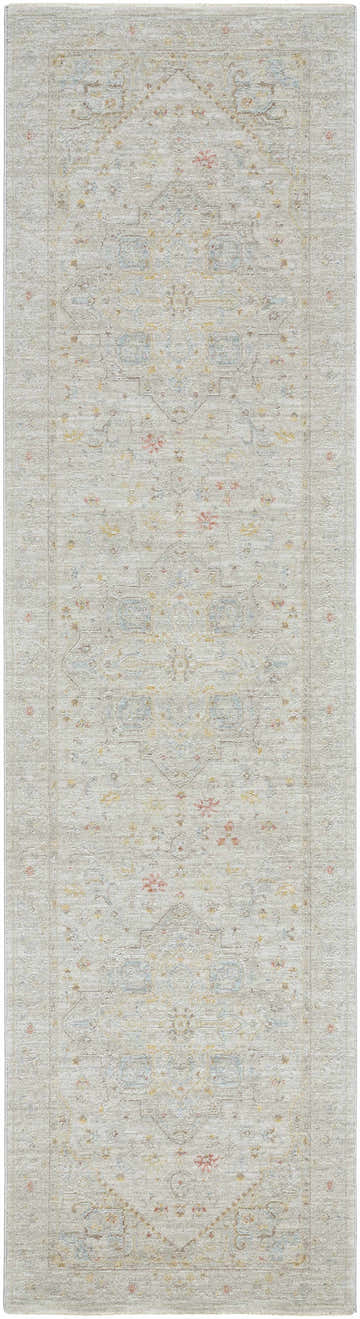 Close-up of Engin Thick Luxe Area Rug. Traditional pattern in amber, dusty pink, olive, and taupe hues. Machine woven polyester texture. Design-Runner-2710