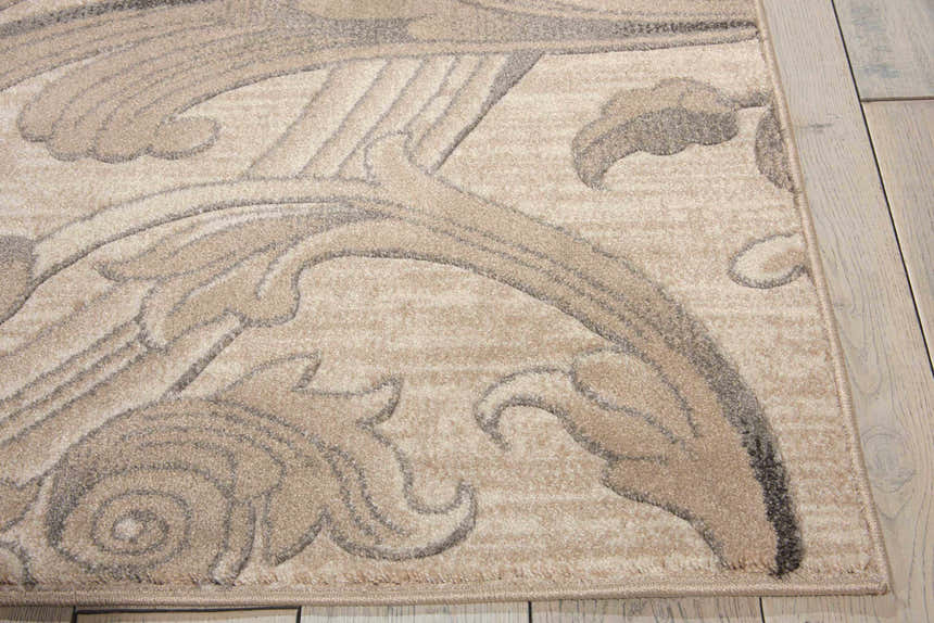 Close up of the Nourison Maxell Mocha rug showing floral pattern and soft, light brown color. Farmhouse style.