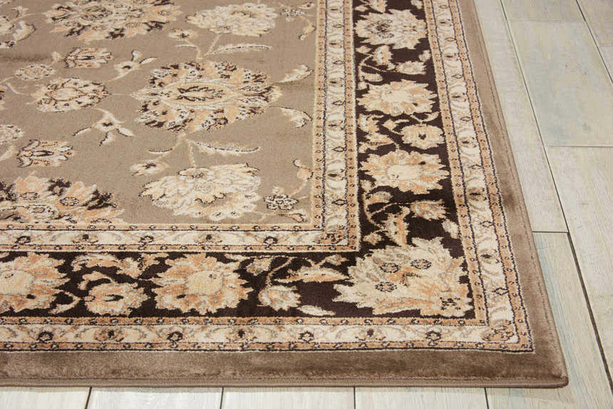 Close-up of the Nourison Ararat Grey Persian Indoor Area Rug, featuring a floral design and brown border.