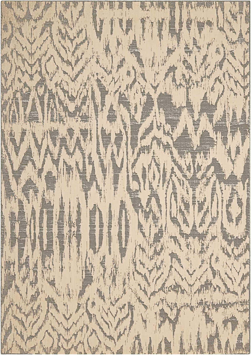 Close-up of the Nourison Nepal Ivory/Grey Vintage rug, featuring a distressed ikat pattern and chestnut accents.
