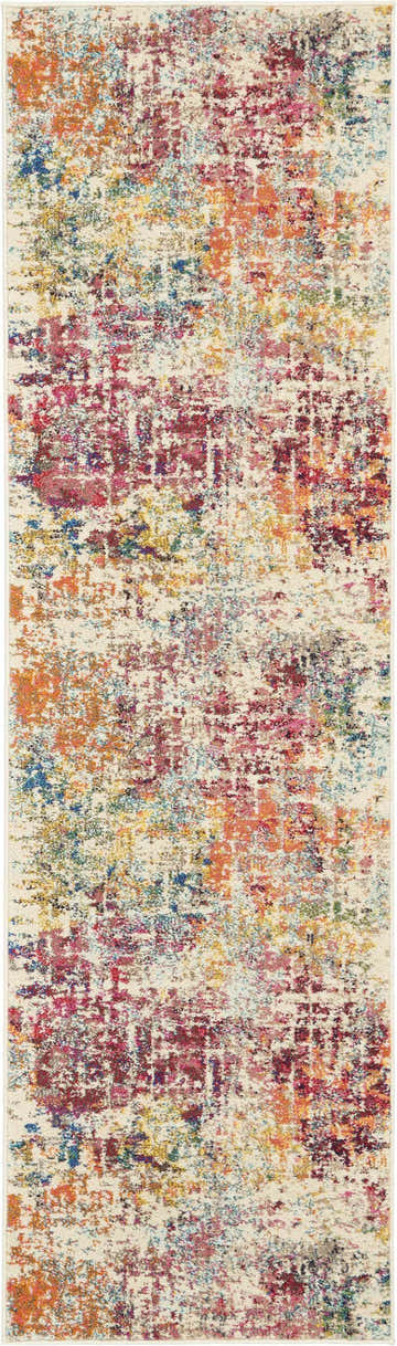 Close-up of Nourison Celestial Pink Multicolor rug. Modern design with pink, orange, blue, and yellow hues on a cream background.