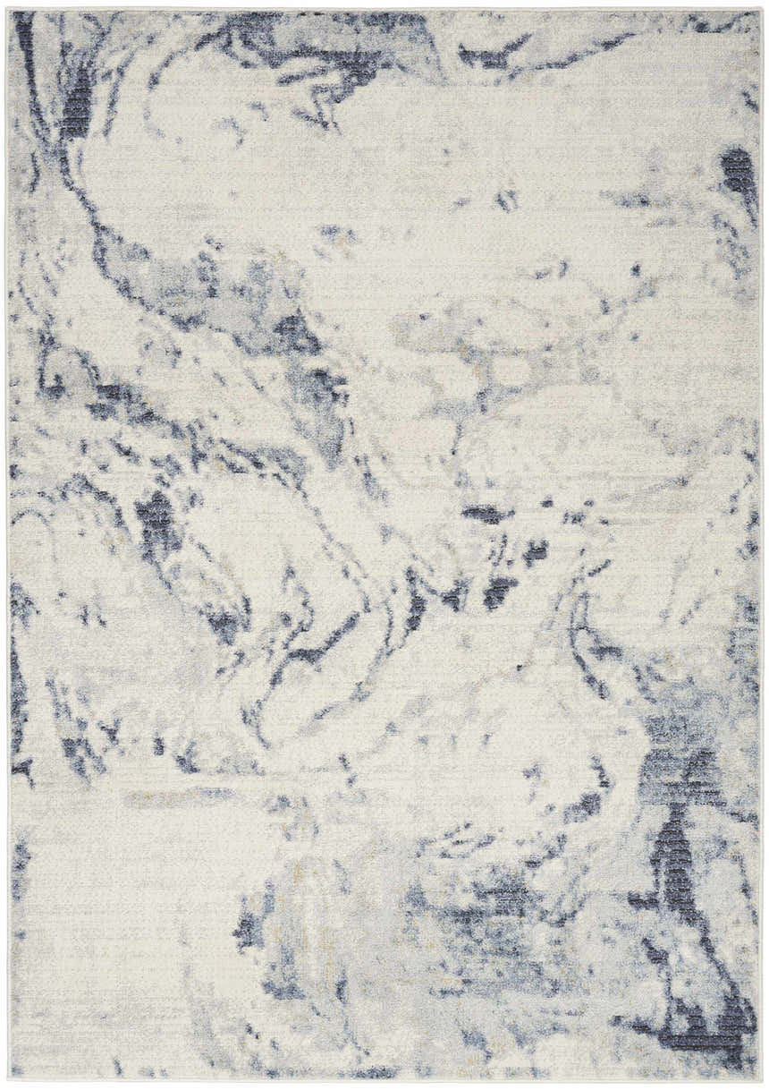 Close-up of the Nourison Motion Ivory Blue rug, showcasing its abstract, marbled pattern and low pile texture.