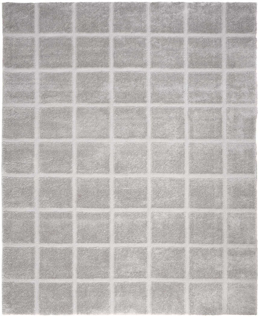 Close-up of the DKNY West End Ave Grey rug, featuring a soft shag pile and a modern square pattern.