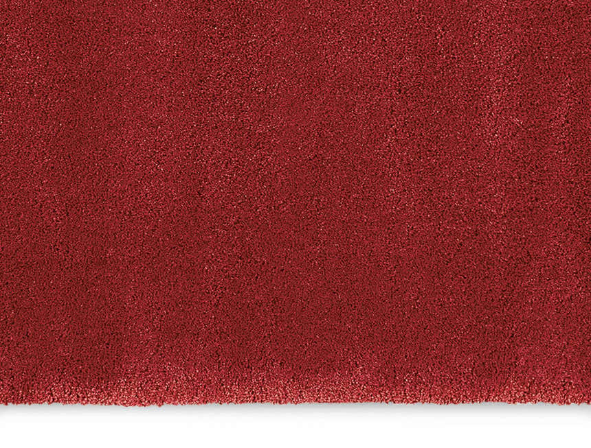 Close-up of the plush texture of the Calvin Klein Brooklyn Burgundy shag rug.