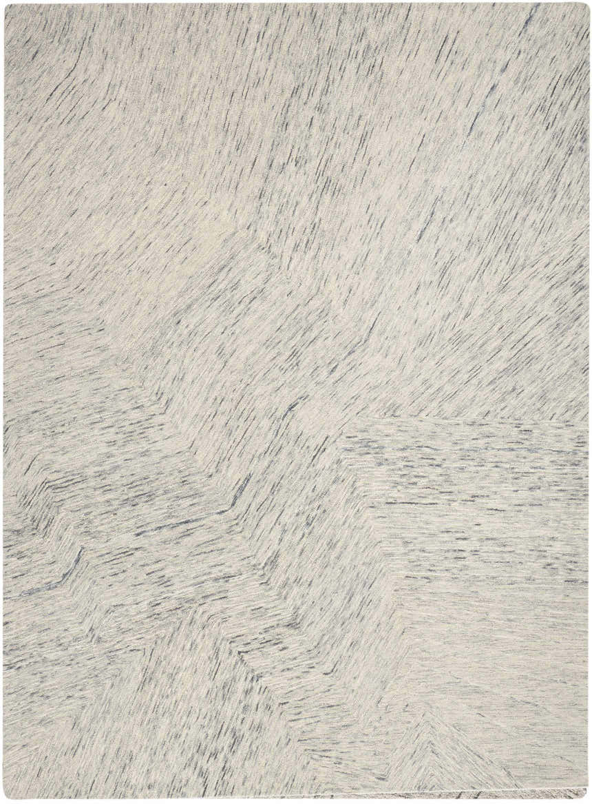 Close-up of DKNY Pure Angles Grey Modern Indoor Area Rug featuring a subtle geometric pattern and textured pile.