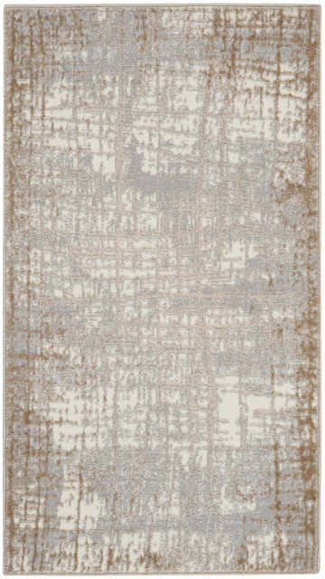 Close-up of Calvin Klein CK950 Rush Ivory Taupe rug. Modern design with ivory, taupe, and gray tones. High pile texture.