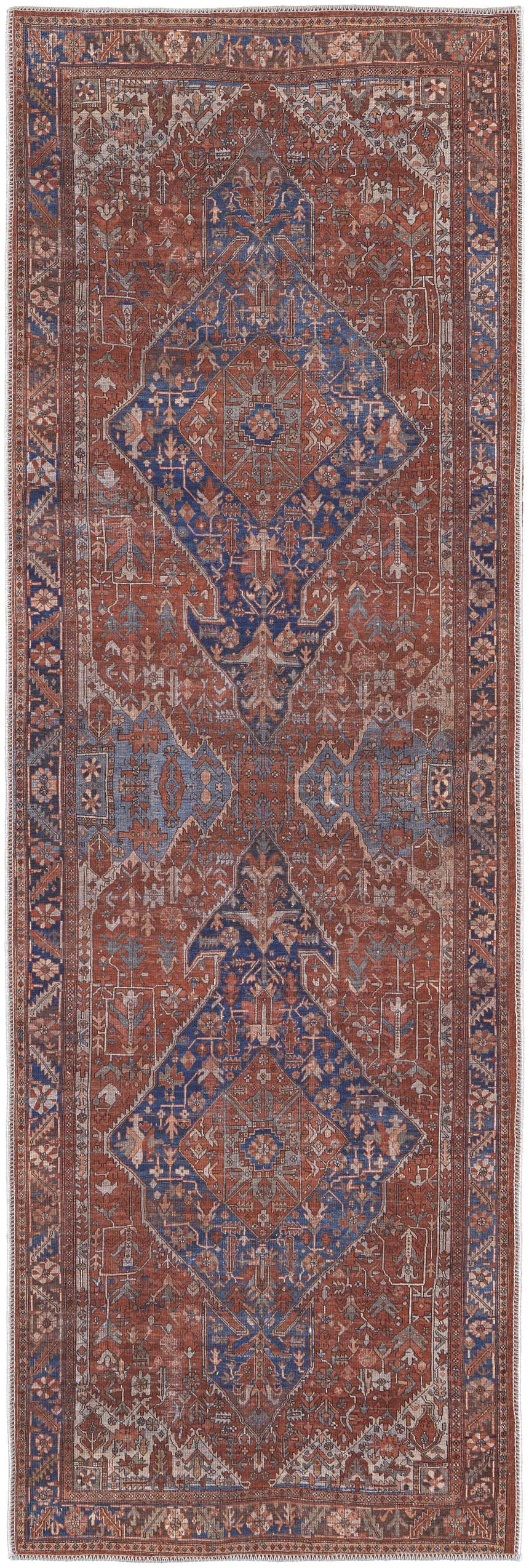 Close-up of the Feizy Rawlins Red/Tan/Blue Washable Area Rug. Intricate geometric medallion design with a vintage, transitional style. Design-Runner