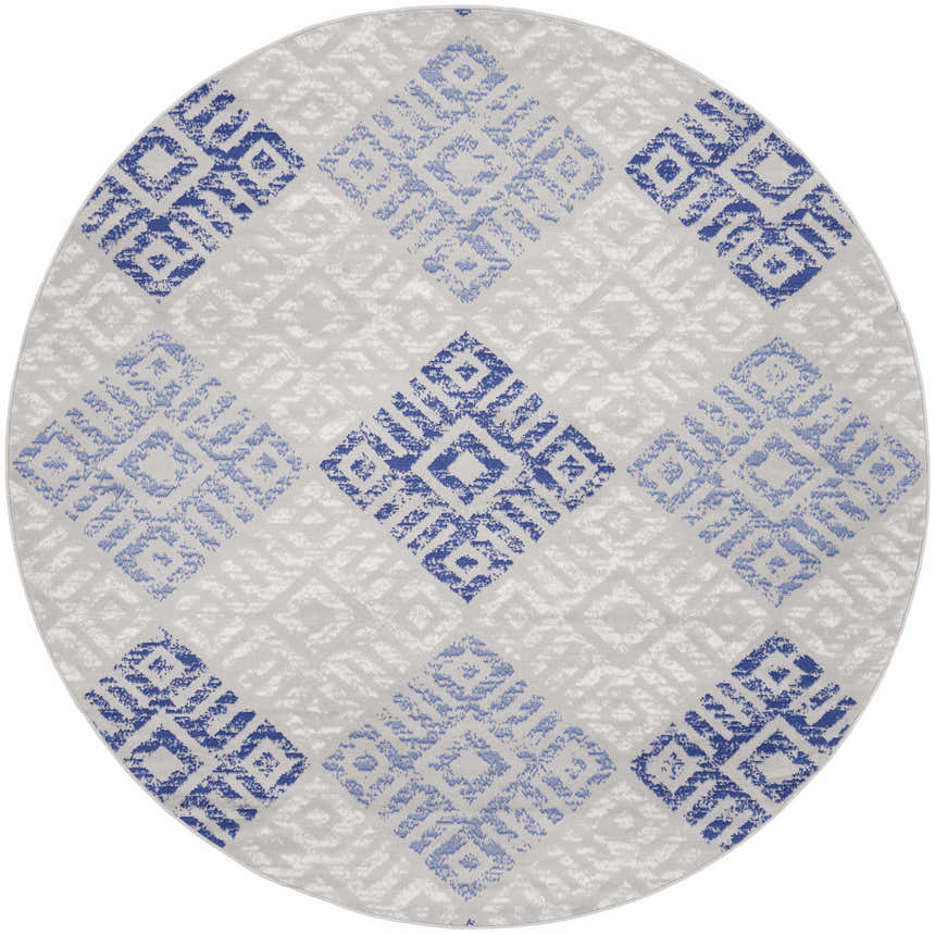 Close-up of round Nourison Whimsicle rug. Grey rug with a blue bohemian diamond pattern.