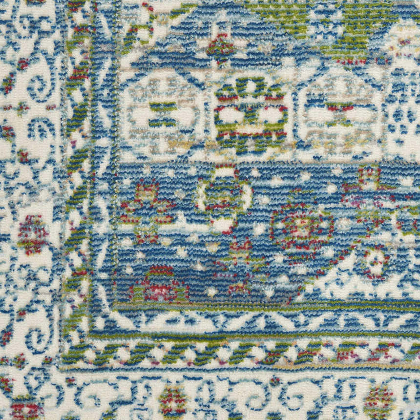 Close-up of Nourison Ankara Global Ivory Light Blue rug, showcasing the bohemian pattern and chestnut accents.