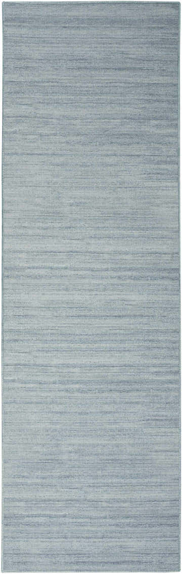 Close-up of Nourison Essentials Aqua Modern Indoor Washable Area Rug with subtle horizontal striations.