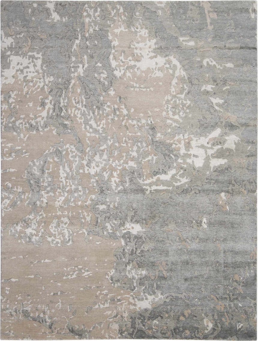 Close-up of the Nourison Silk Shadows Sand area rug. Mid-century modern design with sandstone, gray, and white hues.