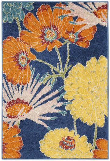 Close-up of the Nourison Allur Navy Multicolor rug, featuring a floral design with orange, yellow, and pink flowers on a navy background.
