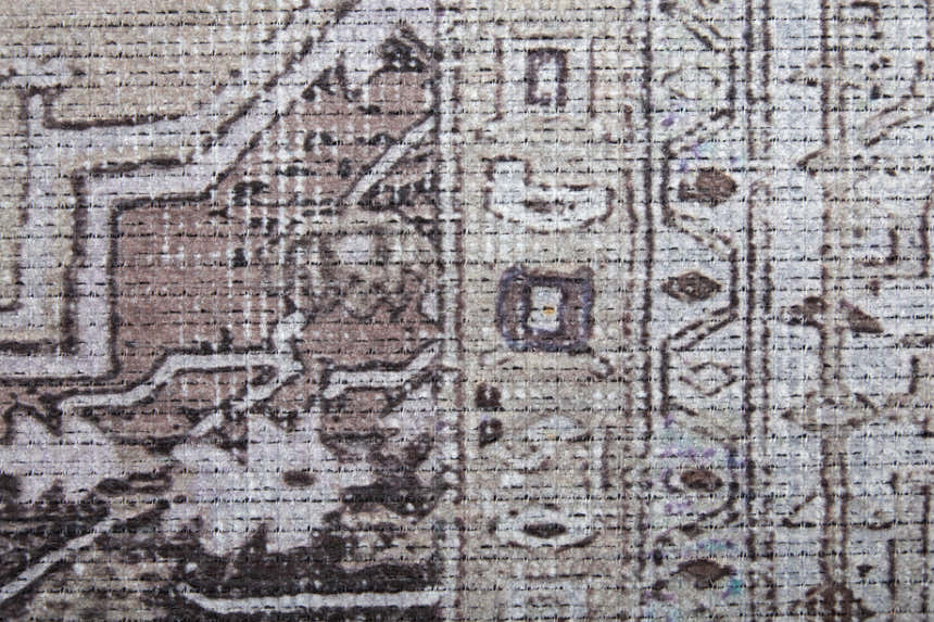 Close up of the Feizy Percy Tan/Ivory/Gray Area Rug showing the transitional medallion pattern and woven texture. Texture
