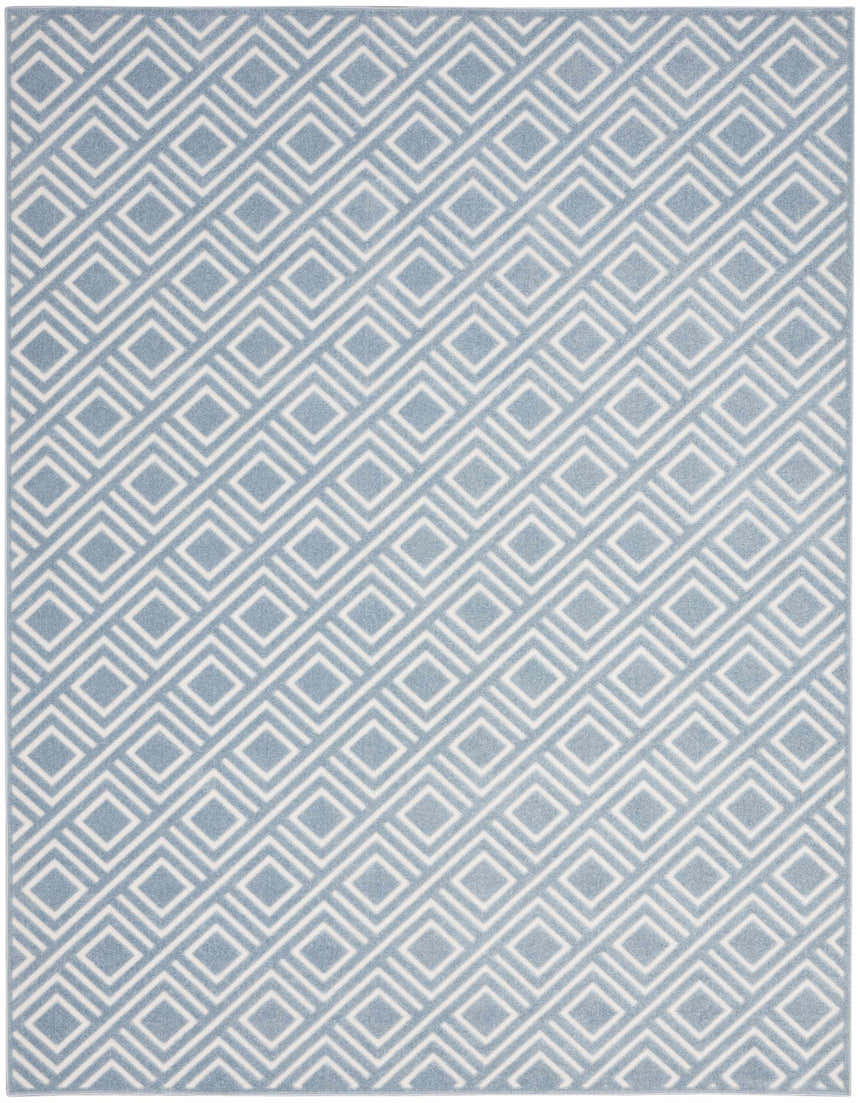 Close-up of the Nourison Care Free Blue Modern Indoor Area Rug with a geometric diamond pattern.